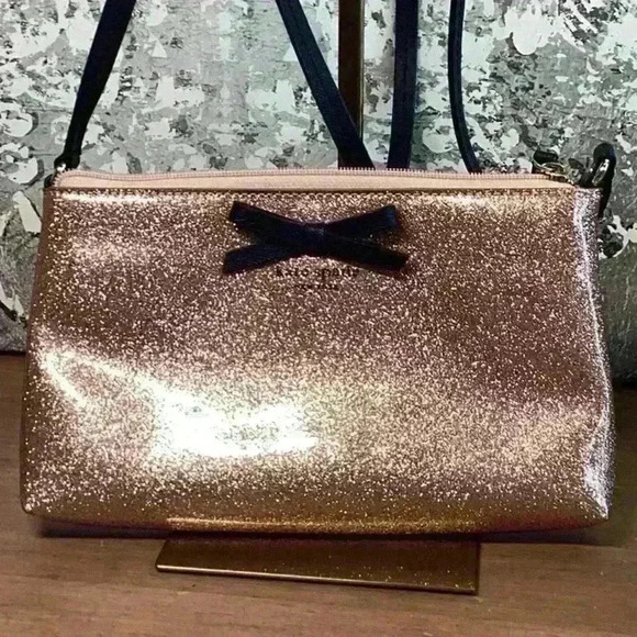 kate spade Handbags - Kate Spade Glitter Pink Crossbody with Black Bow